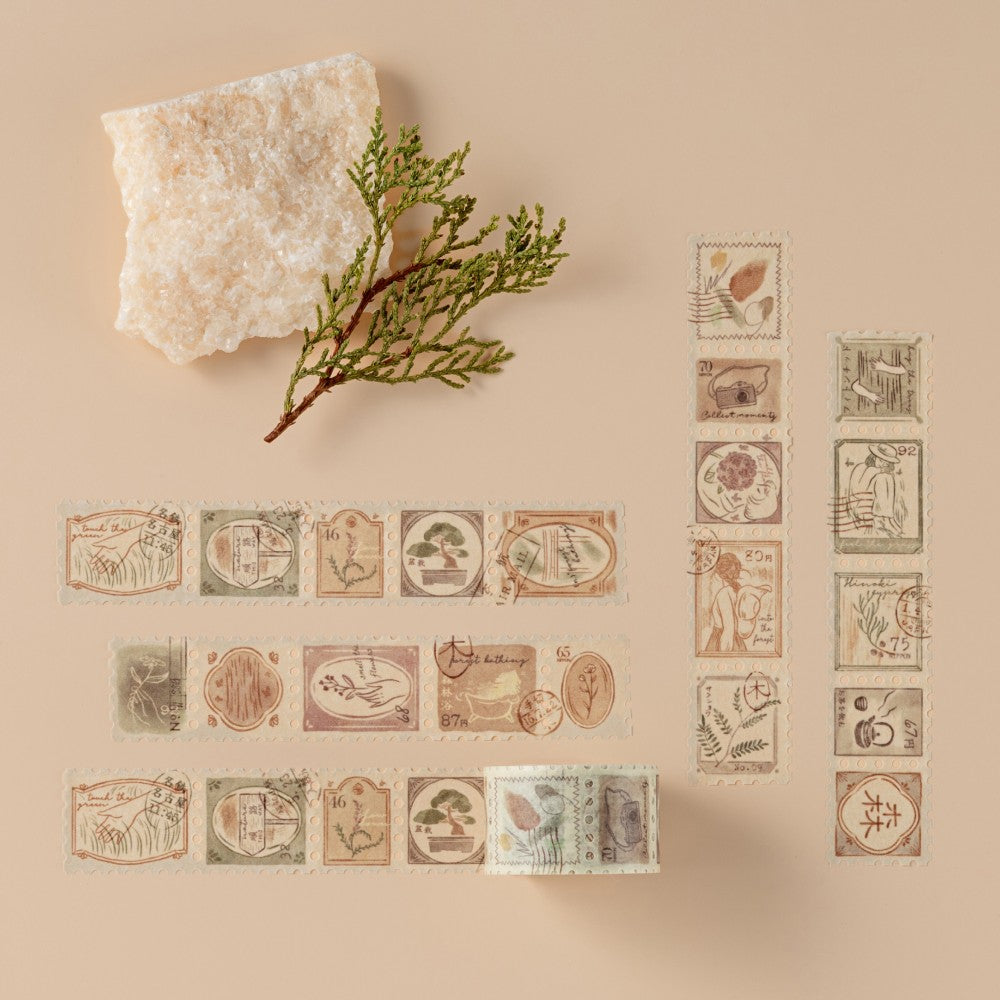 Swatch of stamp washi tape on beige background