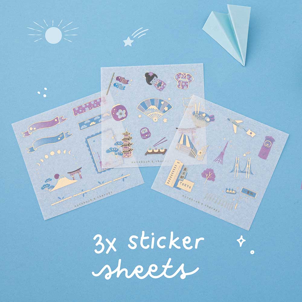 3 sticker sheets with gold foil details on blue background