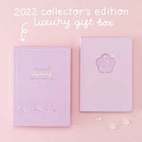 Tsuki Four Seasons: Spring Collector’s Edition 2022 Bullet Journal with 2022 collector’s edition luxury gift box with flowers on light pink background